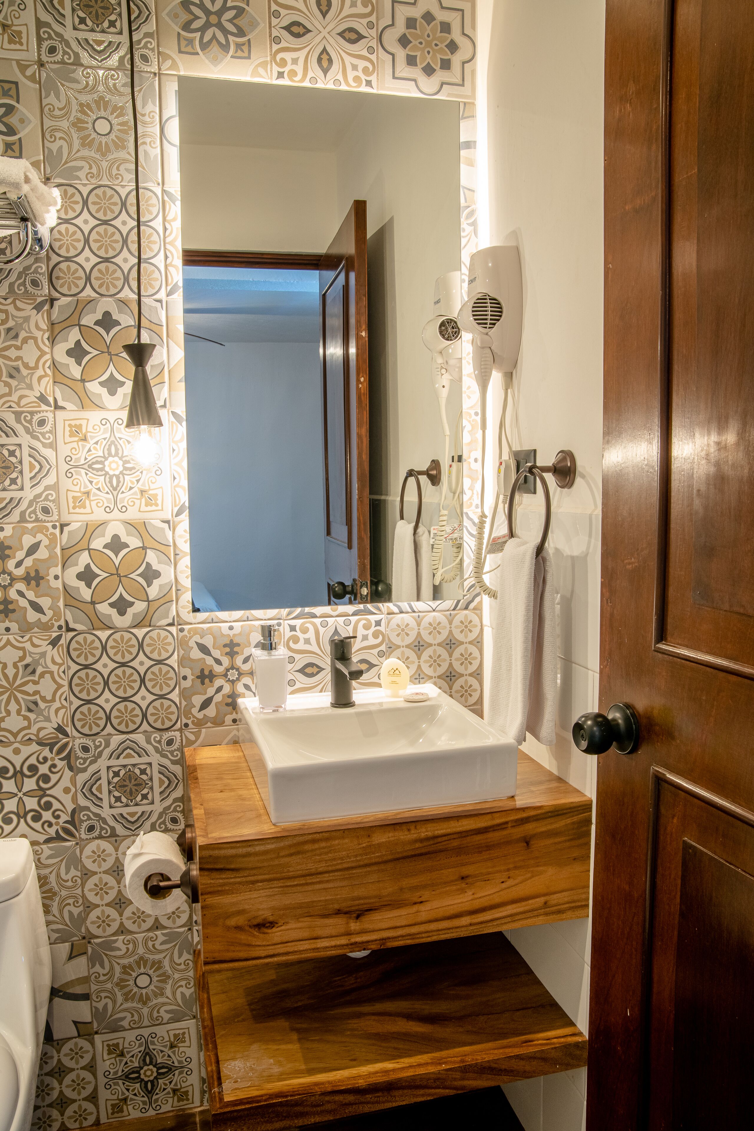 shower, rainfall showerhead, designer toiletries, hair dryer