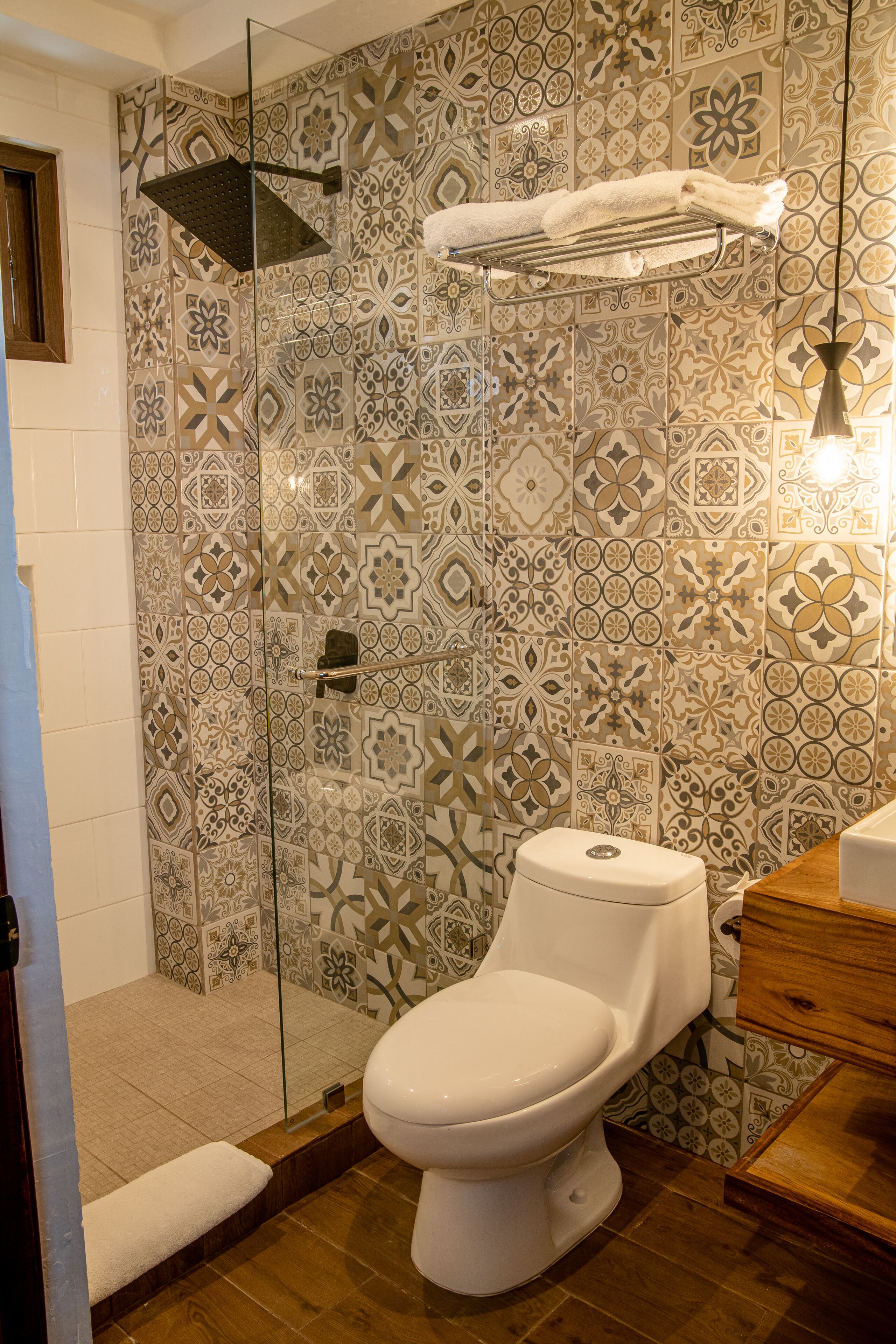 shower, rainfall showerhead, designer toiletries, hair dryer