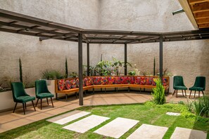Deluxe Double Room, Private Bathroom, Courtyard Area | Courtyard view