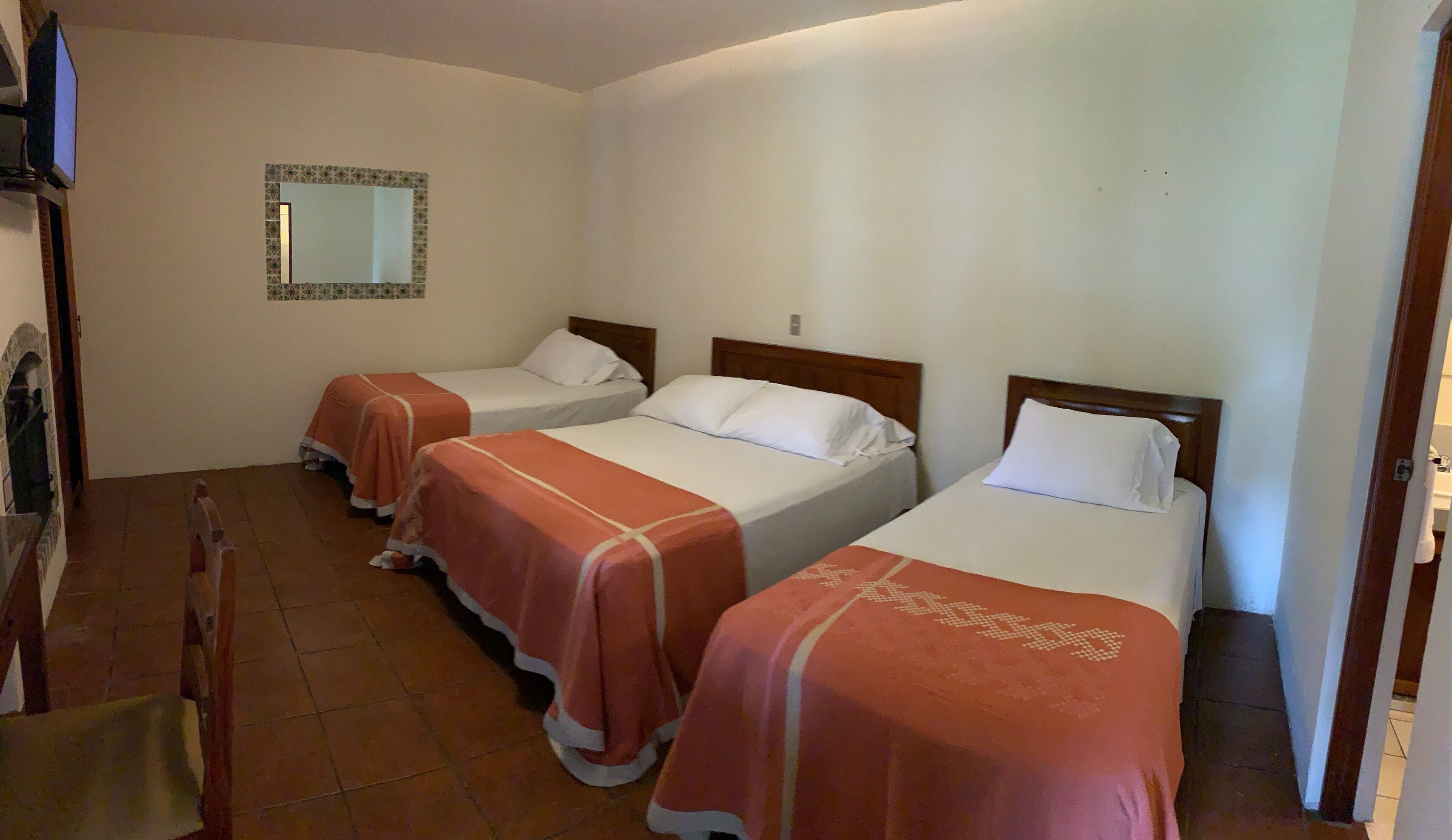 triple room, garden view, courtyard area | premium bedding, tempur-pedic beds, individually decorated