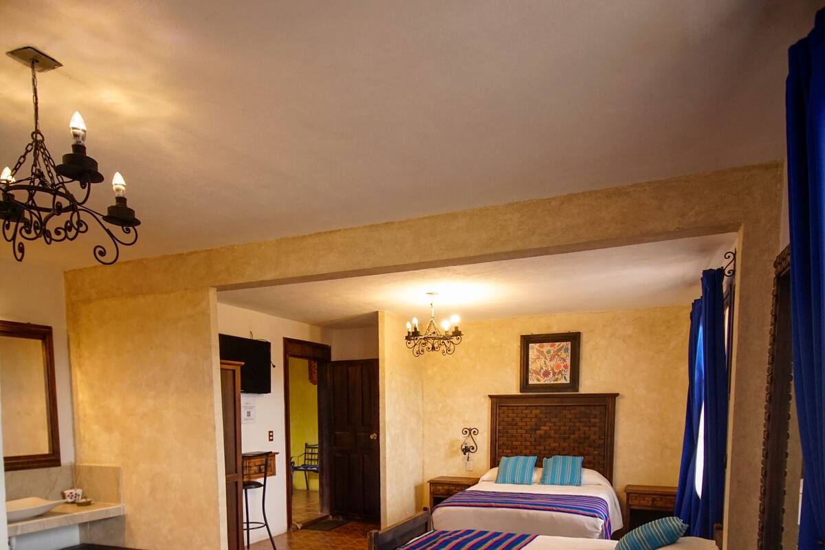 Family Triple Room, 1 Bedroom, City View, Tower | Iron/ironing board, WiFi (free), individually decorated