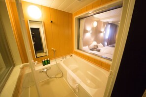 Shower, free toiletries, hair dryer, slippers