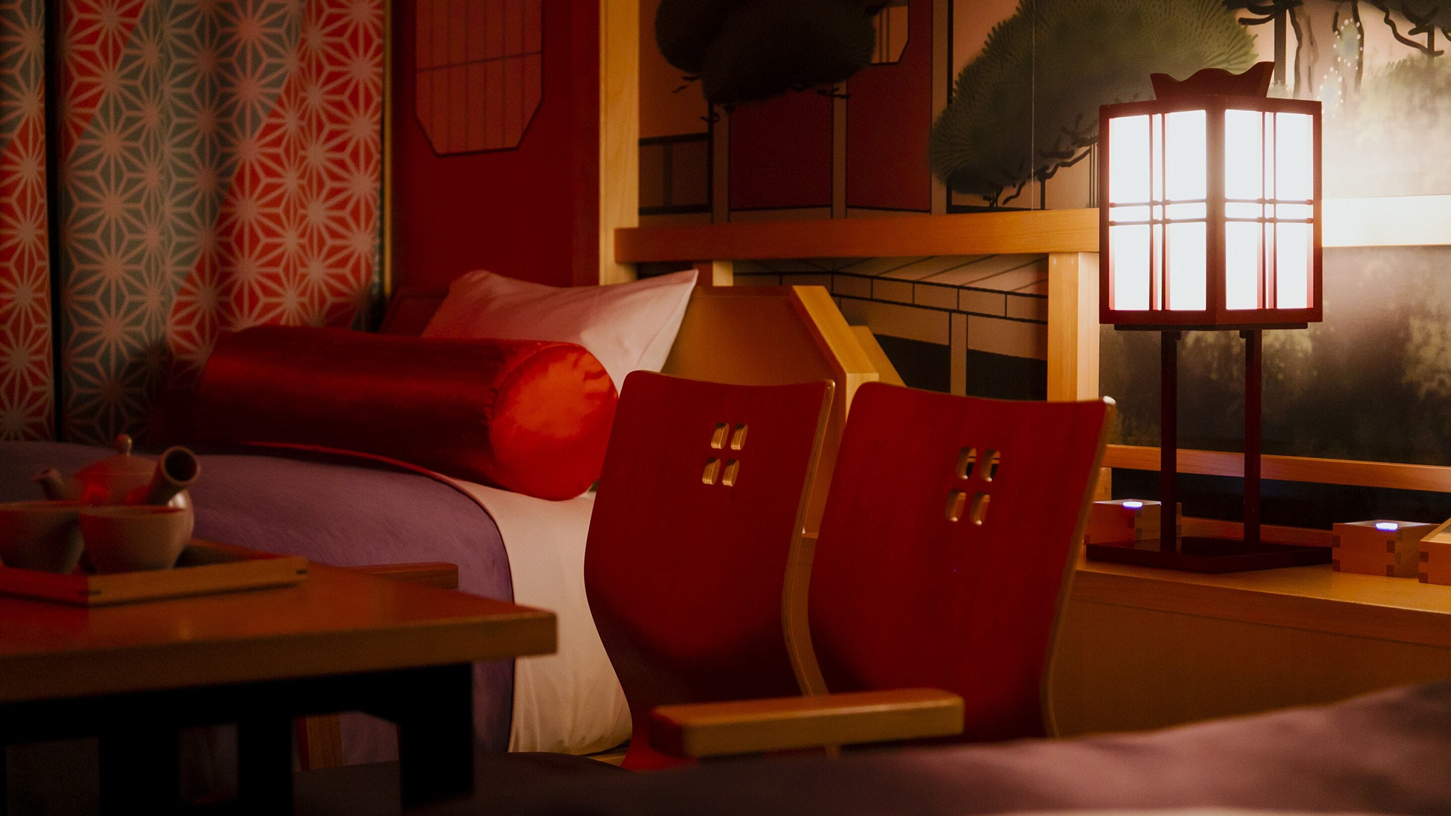 A cozy bedroom with a bed, a nightstand, a lamp, and a chair.