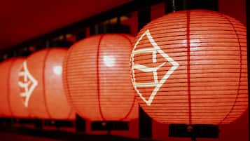 A row of red lanterns with white patterns.