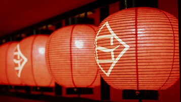 A row of red lanterns with white patterns.