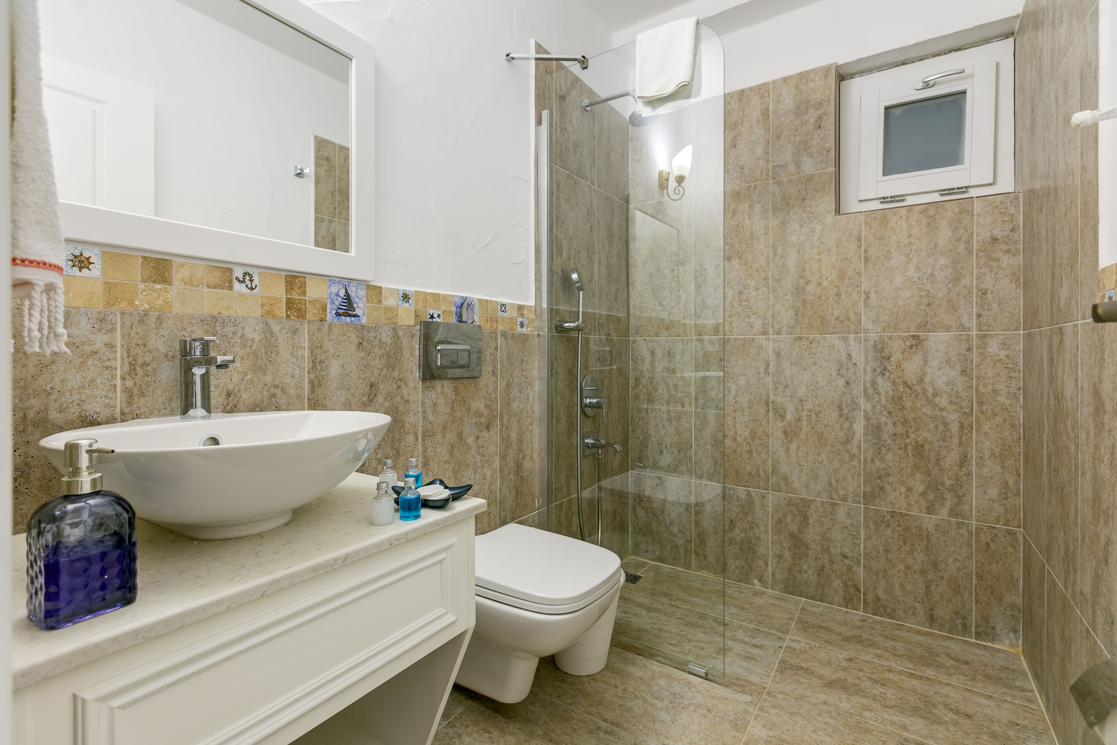 shower, free toiletries, hair dryer, slippers