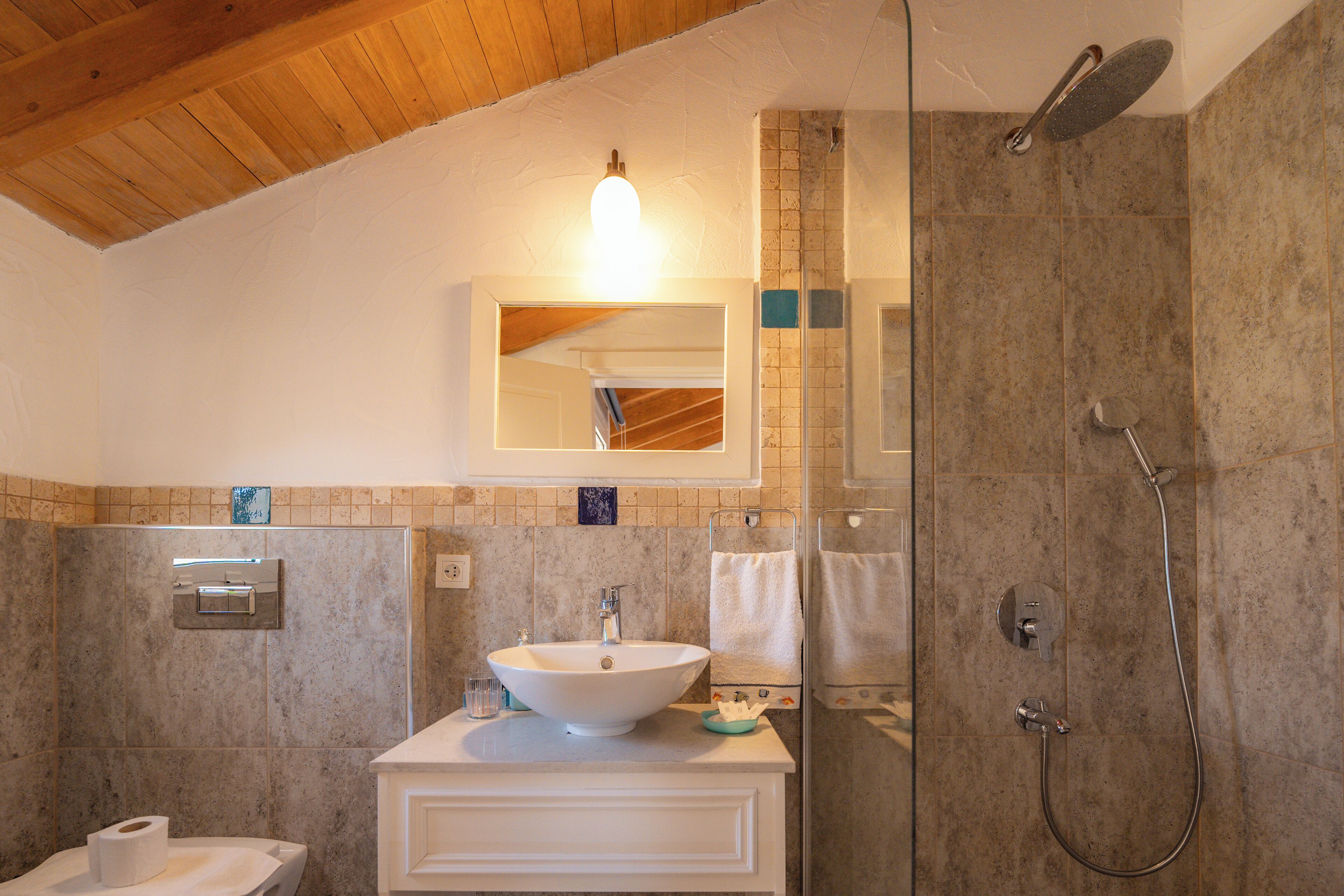 deluxe triple room | bathroom | shower, free toiletries, hair dryer, slippers