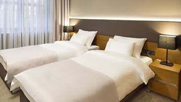 Deluxe Double or Twin Room, 1 Bedroom, Courtyard View | Minibar, in-room safe, desk, soundproofing