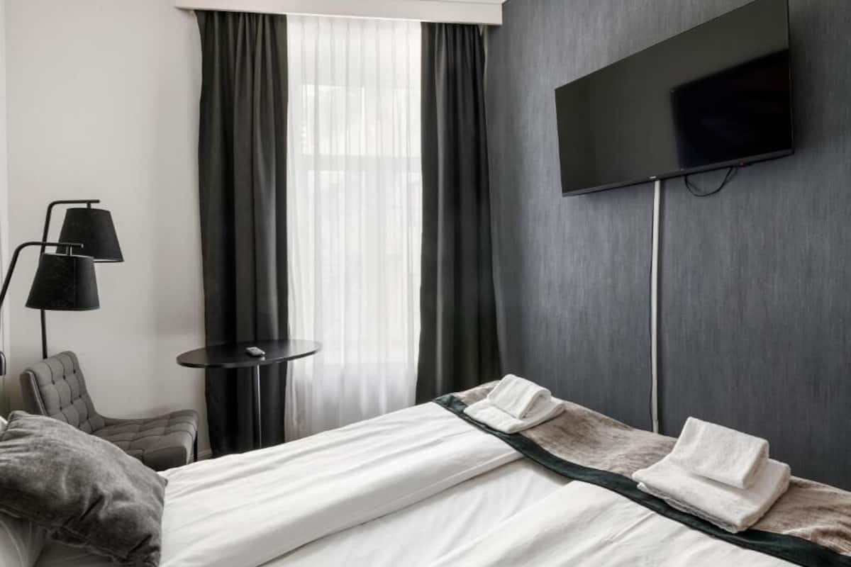 Economy dubbelrum | MörklÀggningsgardiner, gratis wi-fi och sÀngklÀder