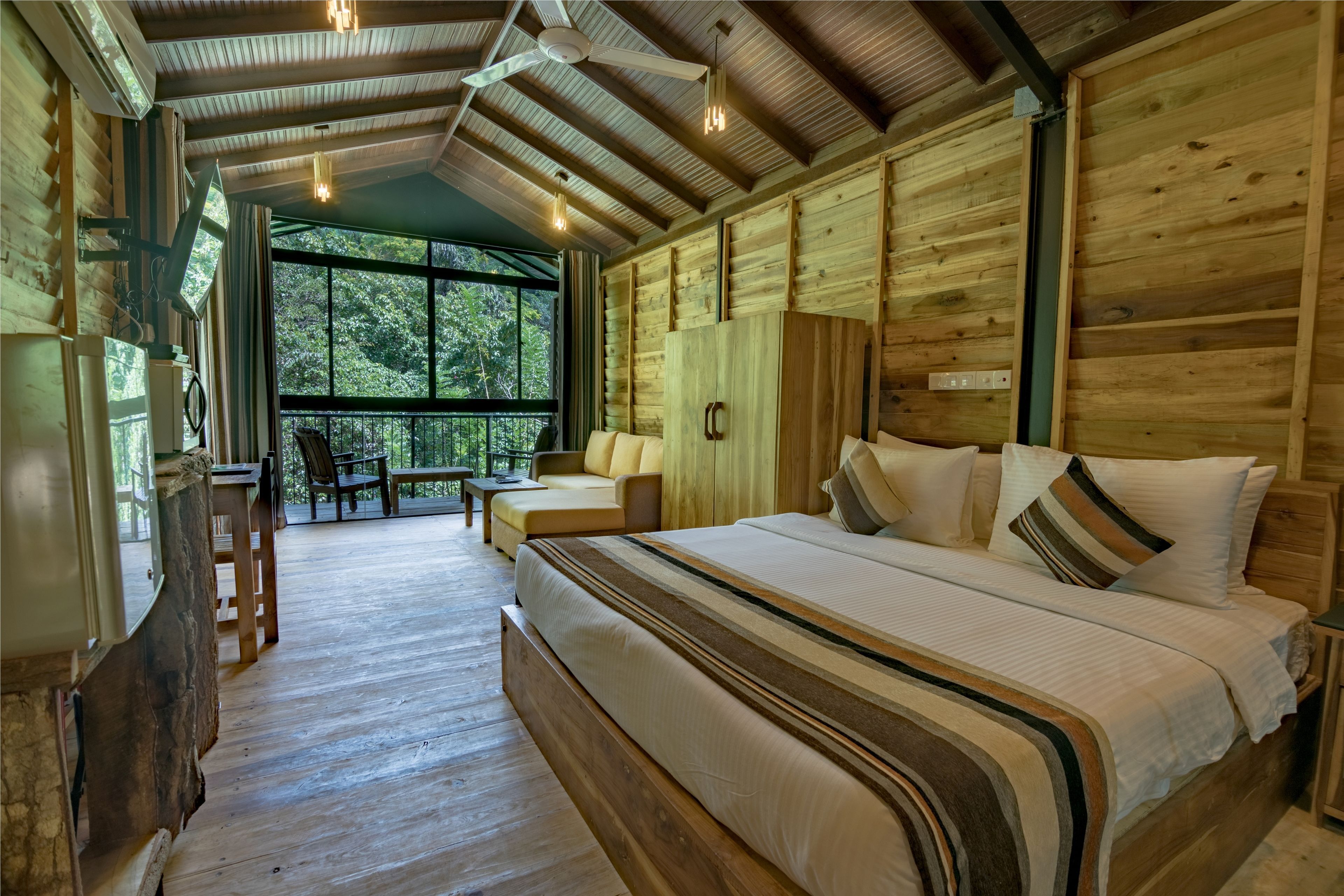 Premium bedding, down comforters, free minibar items, in-room safe