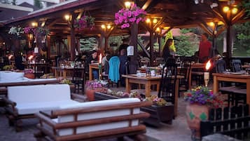 Breakfast, lunch served; international cuisine, al fresco dining
