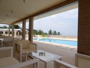 Outdoor pool, pool umbrellas, pool loungers