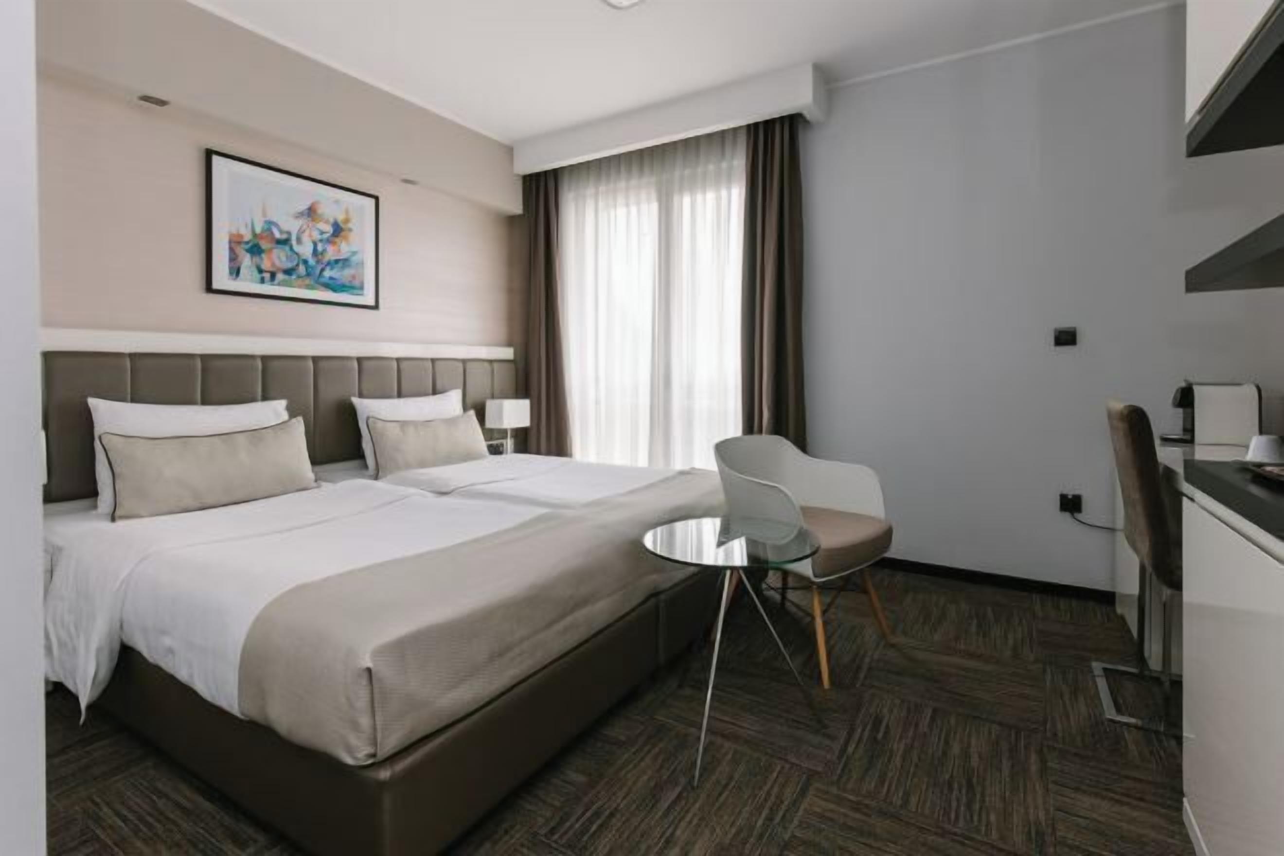 Egyptian cotton sheets, premium bedding, minibar, in-room safe