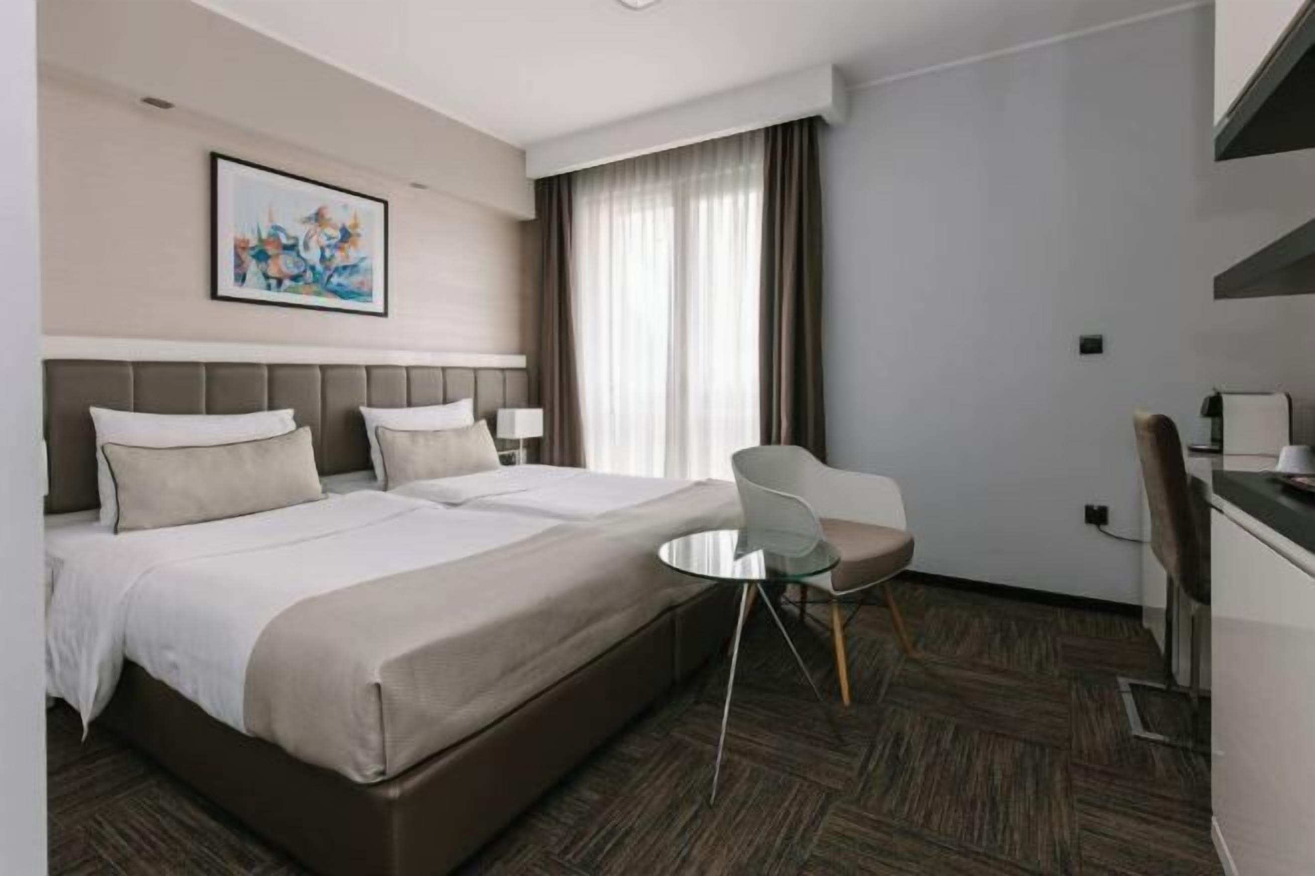 Egyptian cotton sheets, premium bedding, minibar, in-room safe