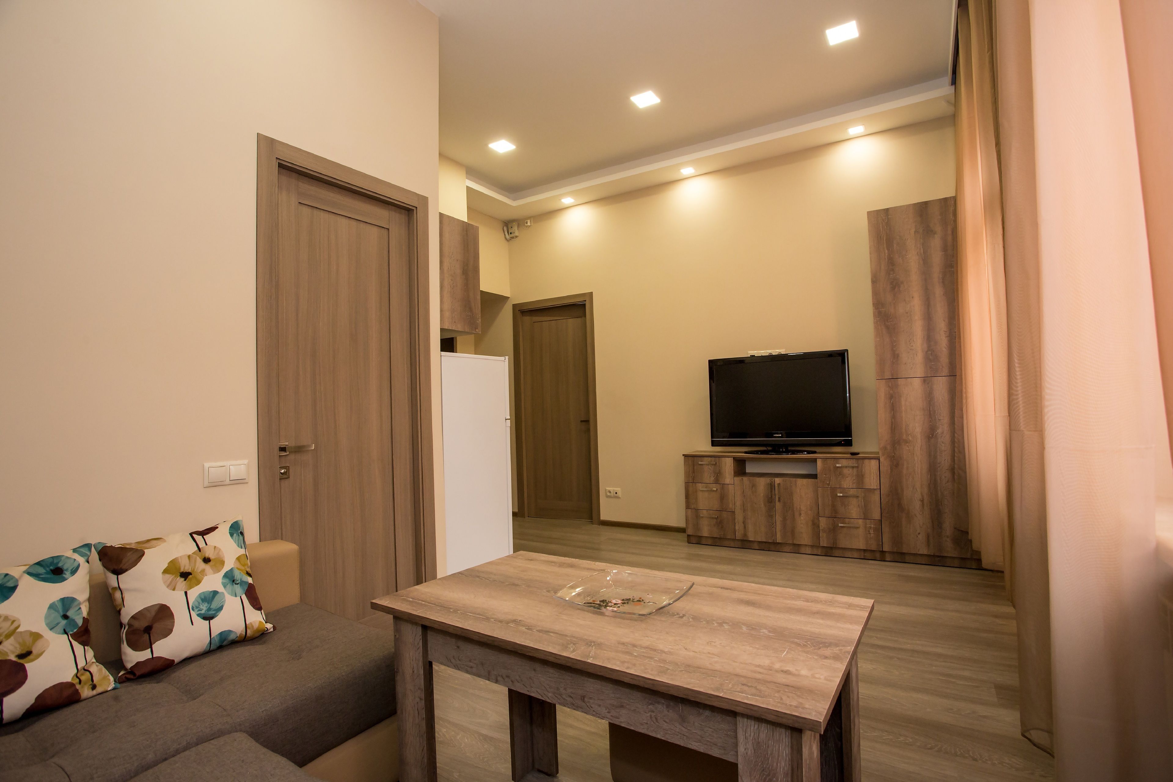 comfort apartment, 1 double bed | living area | flat-screen tv