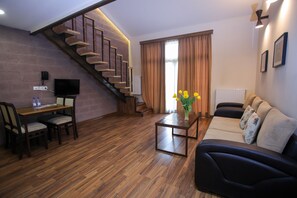 Apartment, 1 Bedroom | Living area | Flat-screen TV