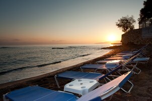 Beach nearby, sun loungers