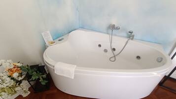 Deluxe Room, 1 King Bed, Jetted Tub | Private spa tub