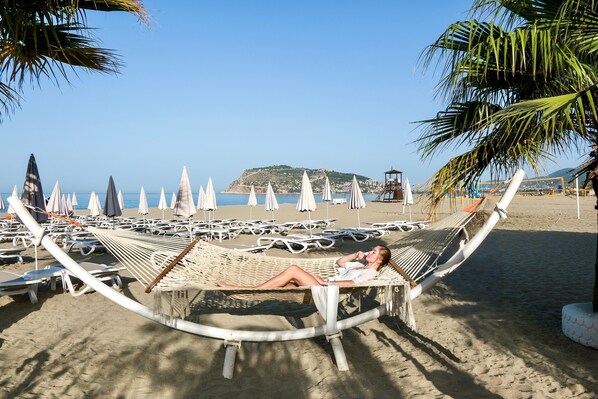 Private beach nearby, sun-loungers, beach umbrellas