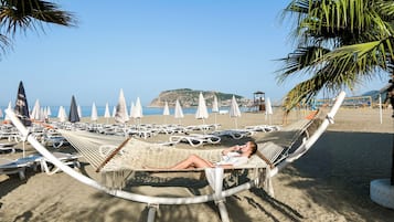 Private beach nearby, sun loungers, beach umbrellas