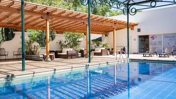 Indoor pool, outdoor pool, open 9:00 AM to 7:00 PM, sun loungers