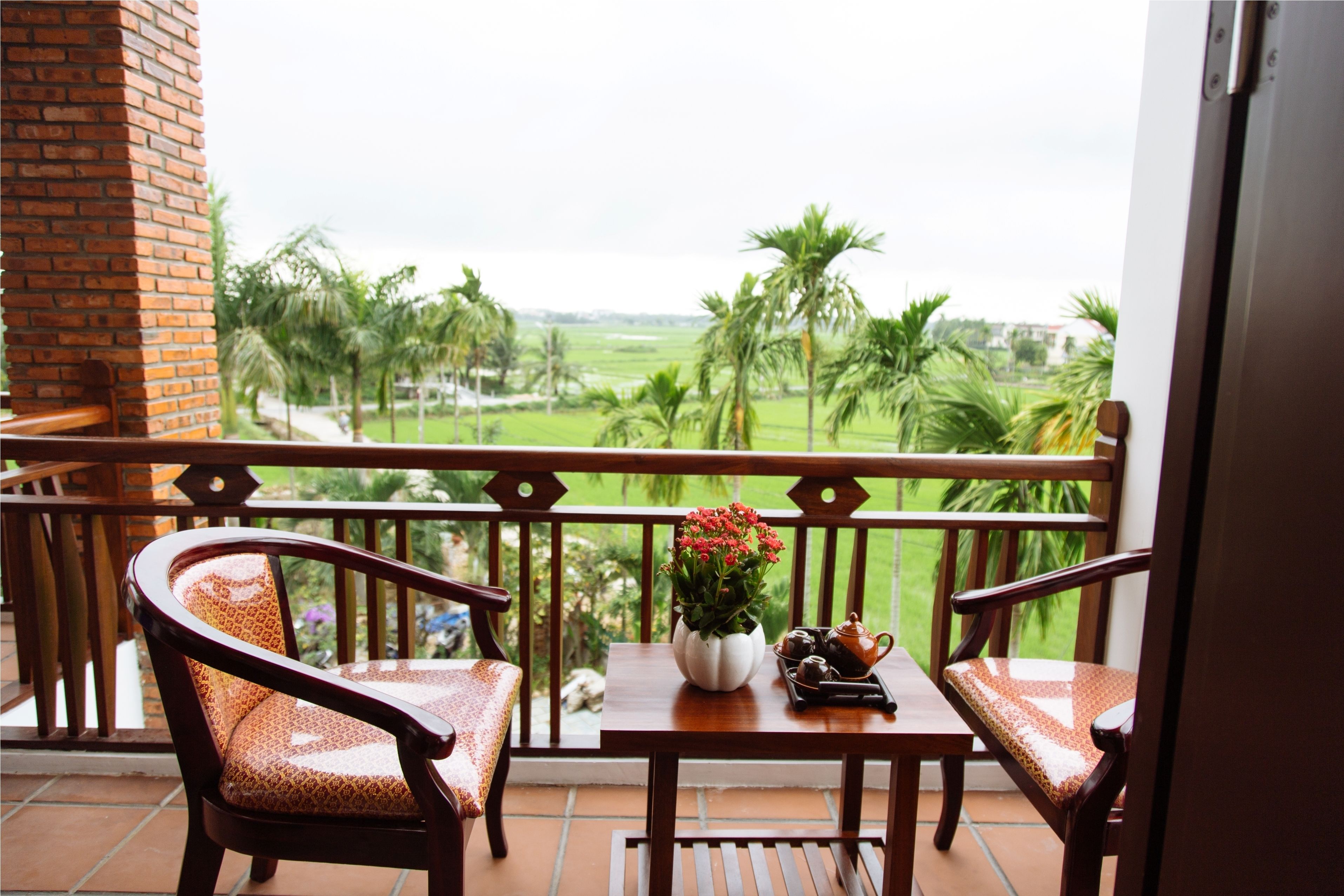 deluxe room, pool view | balcony