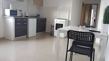 Standard Suite with Terrace, 1 Bedroom | Private kitchen | Mini-fridge, microwave, oven, stovetop