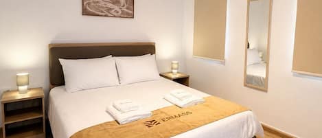 Studio Suite, 1 Queen Bed | Desk, blackout drapes, iron/ironing board, free cribs/infant beds
