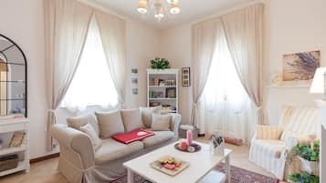 Apartment, 2 Bedrooms | Living room | 42-inch flat-screen TV with satellite channels, TV
