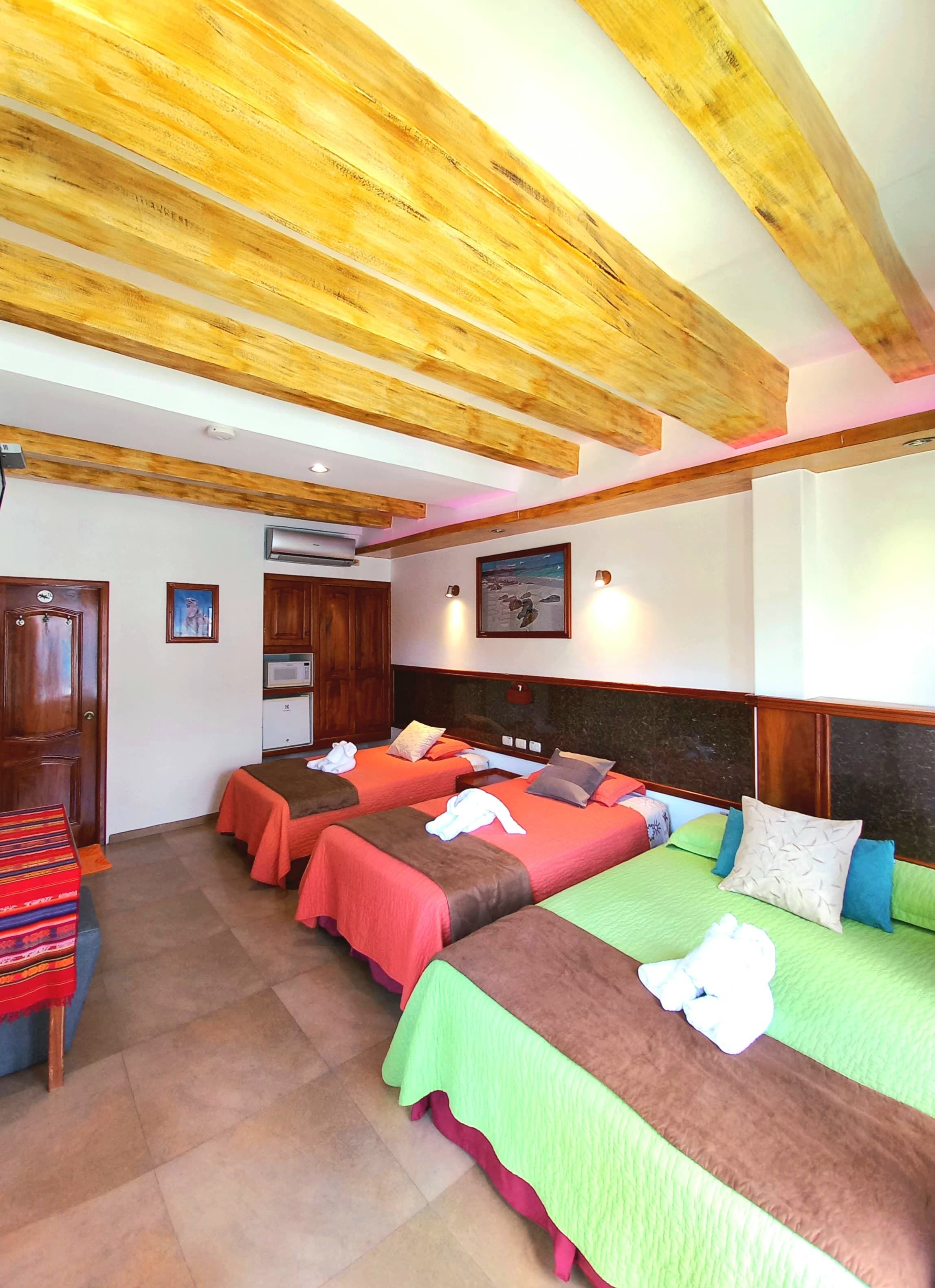 Deluxe Triple Room | Premium bedding, in-room safe, desk, laptop workspace