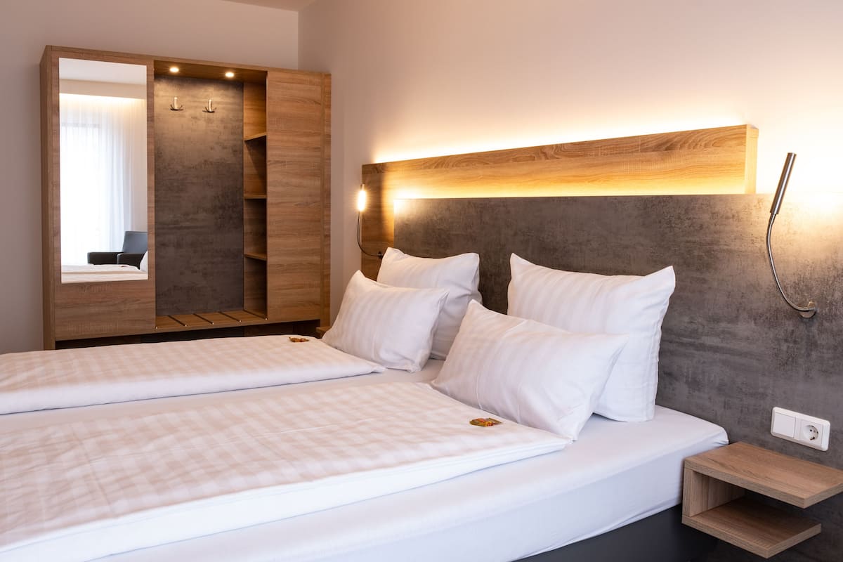 comfort double room (plus) | hypo-allergenic bedding, desk, laptop workspace, blackout curtains