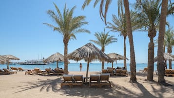Private beach, scuba diving, windsurfing, beach volleyball