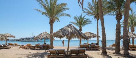 Private beach, scuba diving, windsurfing, beach volleyball