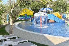 A water park with a central water feature, slides, and a colorful play area. - Grifid Hotel Encanto Beach (Varna)