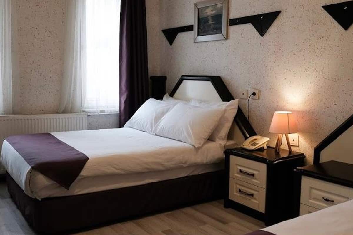 Ropa de cama de alta calidad y minibar