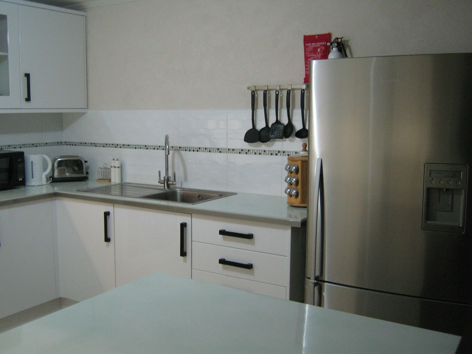 Apartment, 2 Bedrooms | Private kitchen | Fridge, microwave, stovetop, coffee/tea maker