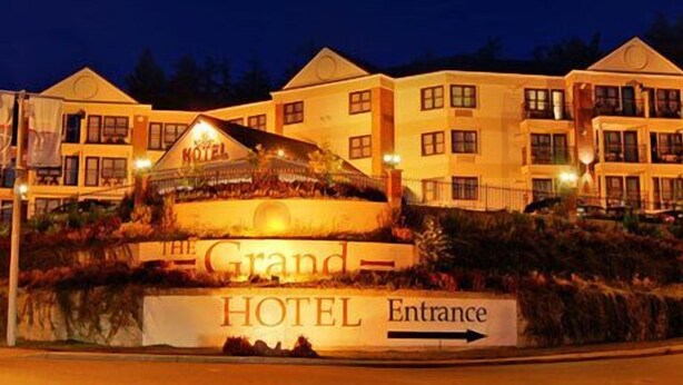 A multi-story hotel with a prominent entrance sign. - The Grand Hotel Nanaimo (Nanaimo)