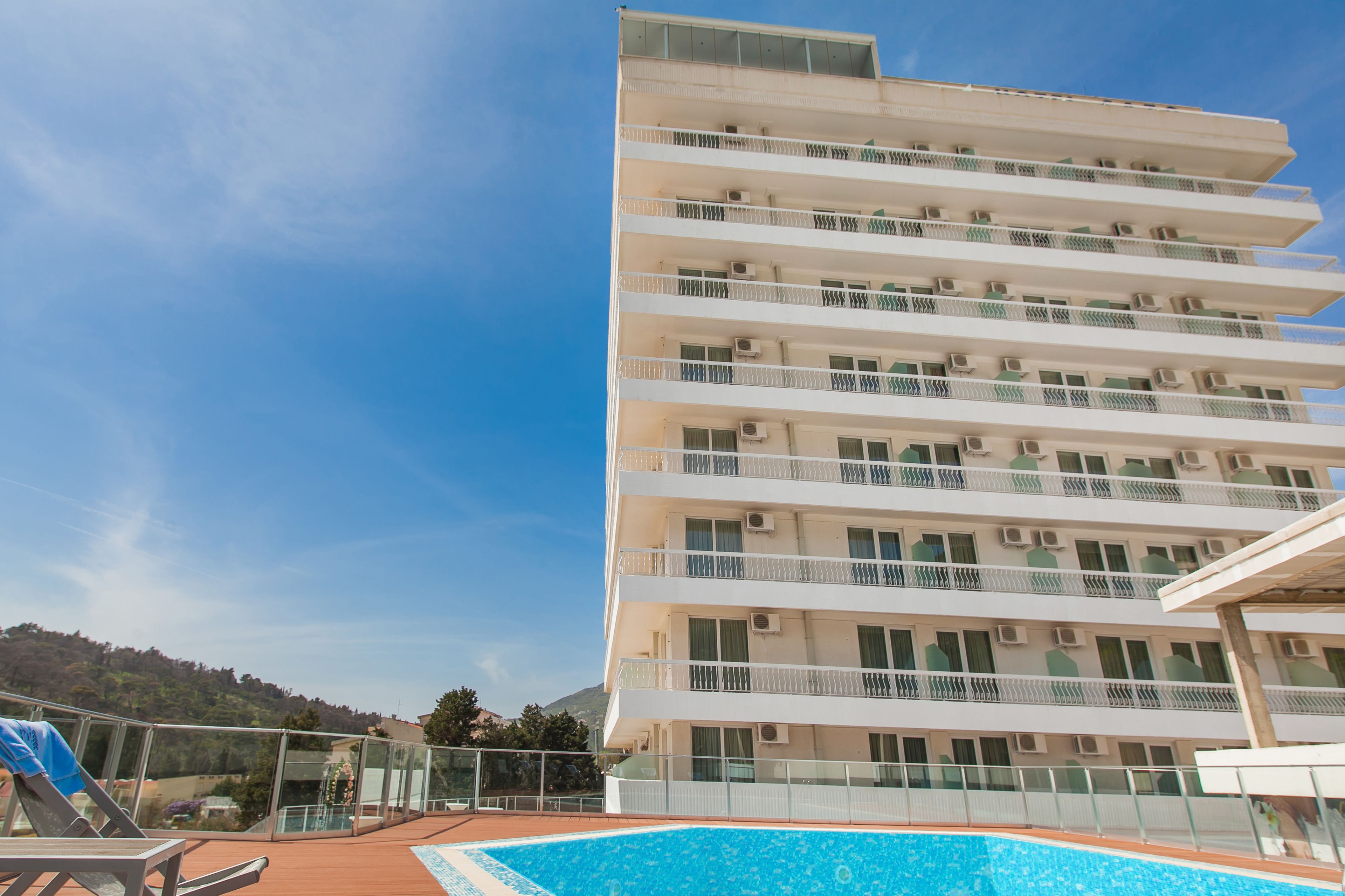 Outdoor pool, pool umbrellas, pool loungers