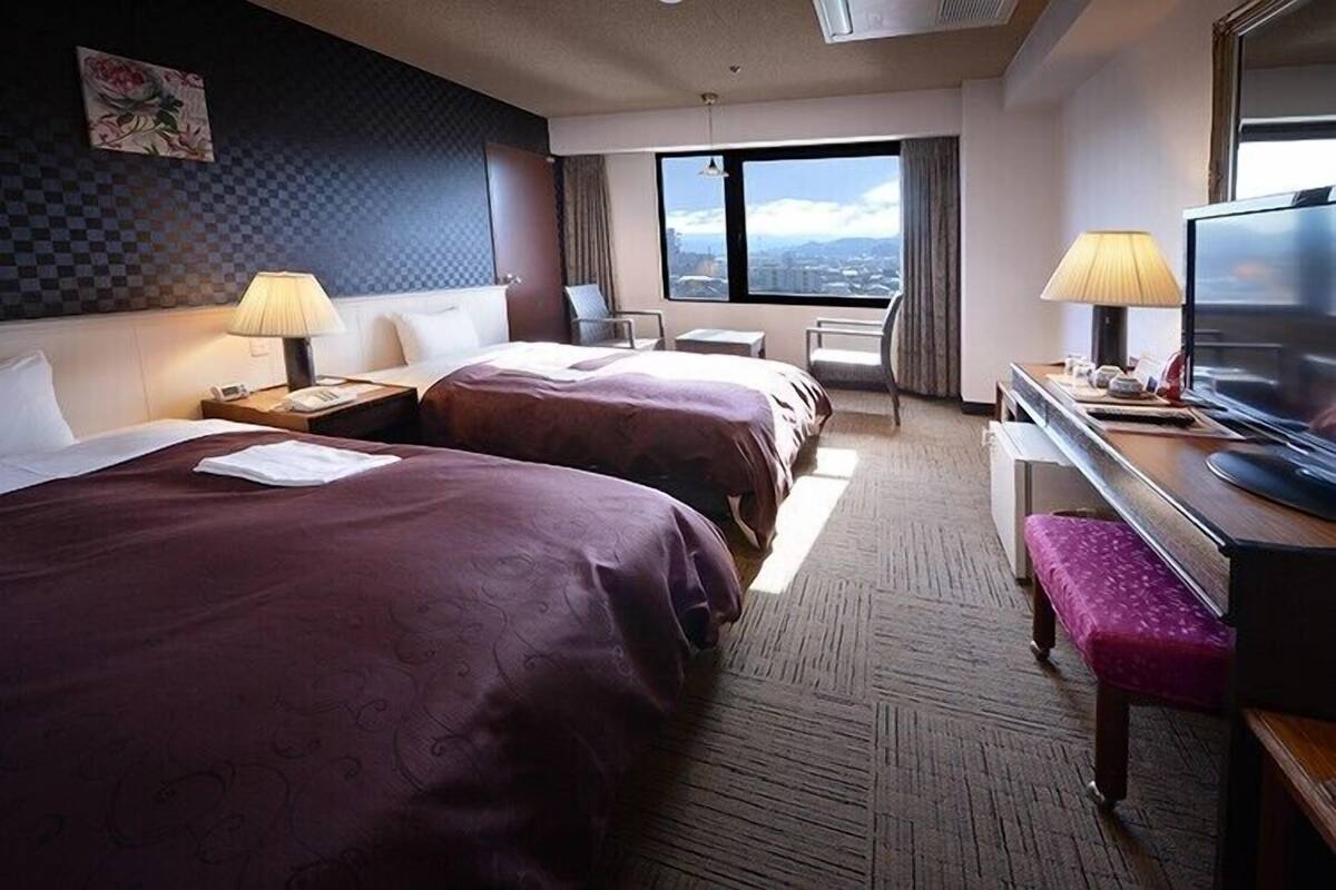 Luxe beddengoed, een bureau, gratis wifi, beddengoed