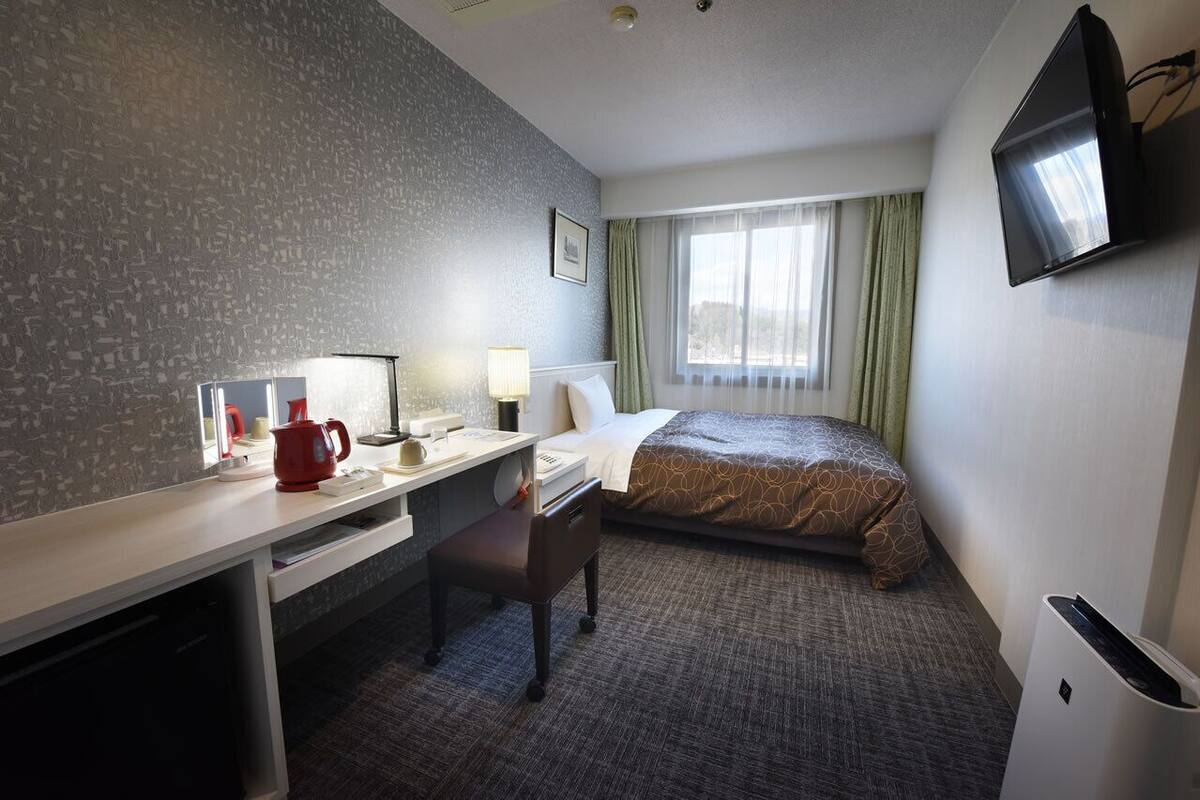 Luxe beddengoed, een bureau, gratis wifi, beddengoed