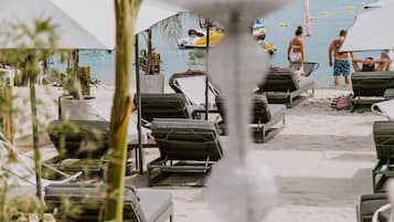 Private beach, sun-loungers, beach umbrellas, beach bar