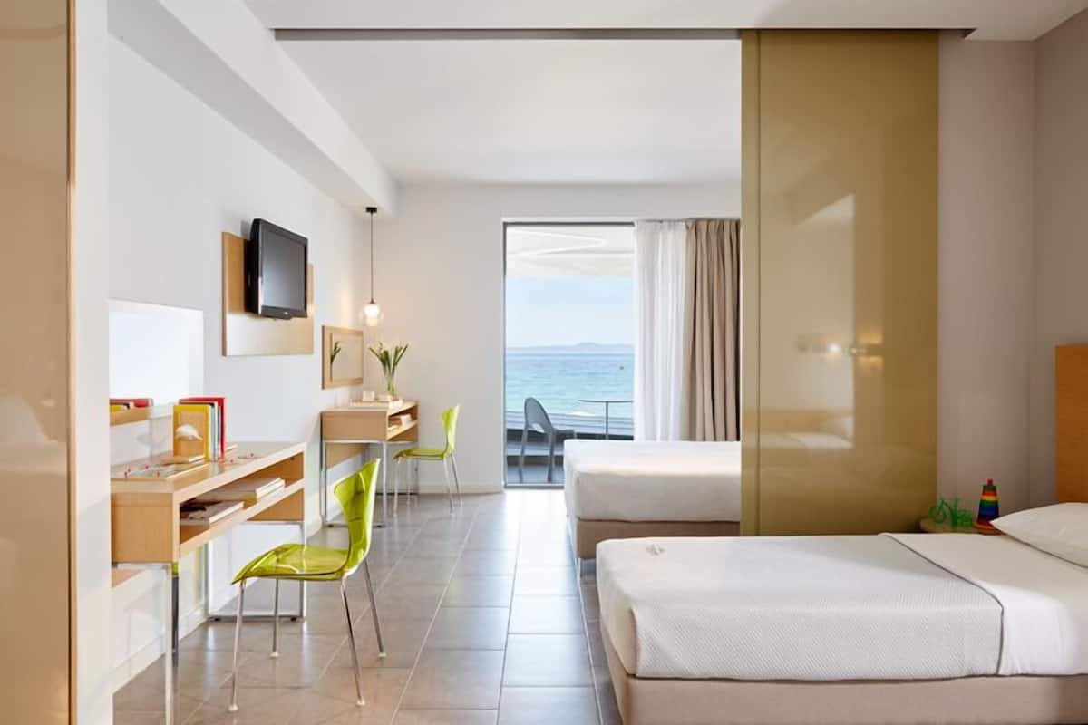 Deluxe Room, Sea View | In-room safe, desk, blackout drapes, soundproofing
