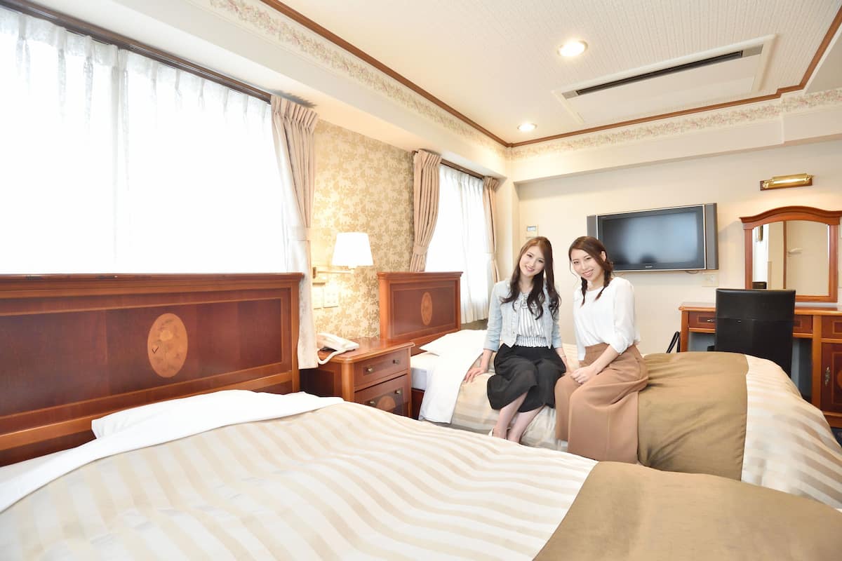 Deluxe Twin Room, Smoking | Seterika/papan seterika, Wi-fi percuma, cadar katil
