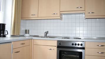 Comfort Apartment, Balcony, Garden View (Erdgeschoss) | Private kitchen | Full-size fridge, microwave, stovetop, espresso maker