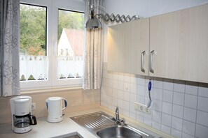 LÀgenhet - balkong (Dachgeschoss) | Eget kök | Stort kylskÄp, mikrovÄgsugn, spishÀll och espressobryggare