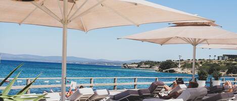 Private beach nearby, sun loungers, beach umbrellas, beach bar