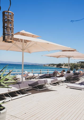 Private beach nearby, sun loungers, beach umbrellas, beach bar