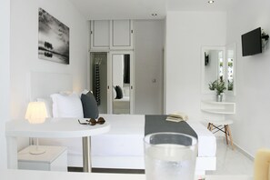 Deluxe Studio, 1 Bedroom, Kitchenette, Beach View | Individually decorated, individually furnished, desk, laptop workspace