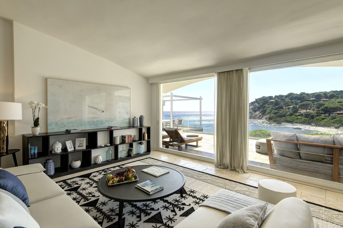 luxury villa, 4 bedrooms, private pool, sea view | living room | 43-inch flat-screen tv with cable channels, tv, table football