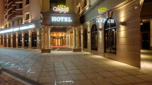 Front of property - evening/night - Hotel Grand Voyage (Almaty)